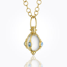 18K Classic Cabochon Amulet with oval rock crystal, royal blue moonstone and tanzanite