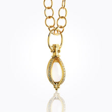 18K Classic Amulet with oval rock crystal and diamond pavé