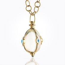 18K Classic Cabochon Amulet with oval rock crystal, royal blue moonstone and tanzanite