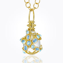 18K Sea Star Amulet with oval rock crystal, royal blue moonstone, blue sapphire and diamond
